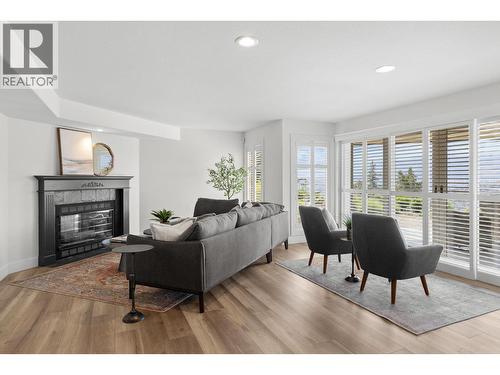 2150 Breckenridge Court, Kelowna, BC - Indoor Photo Showing Living Room With Fireplace