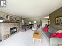 1672 Thayer Court, Kelowna, BC  - Indoor Photo Showing Living Room With Fireplace 