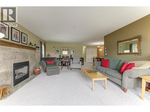 1672 Thayer Court, Kelowna, BC - Indoor Photo Showing Living Room With Fireplace