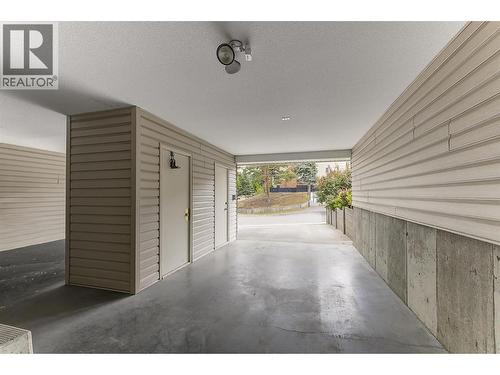 Covered Carport with Secure Storage Room - 1672 Thayer Court, Kelowna, BC -  With Exterior