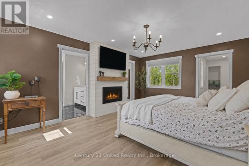 Fireplace is AI but could be installed - 23 Jack Hills Road, Trent Lakes, ON - Indoor Photo Showing Bedroom With Fireplace