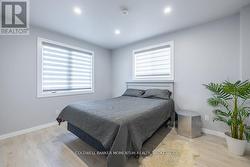 LARGE BEDROOM WITH LOTS OF NATURAL LIGHT - 