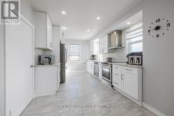 EXTRA LARGE GALLEY KITCHEN WITH NEWER APPLIANCES - 