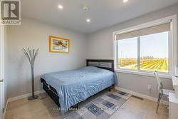 LARGE BEDROOM ON 2ND LEVEL WITH VIEW OF VINEYARDS - 
