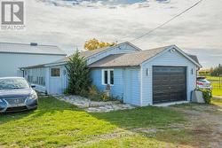 EXTRA LARGE GARAGE WITH SHOP/GREAT INCOME PRODUCER - 