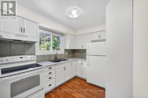121 - 1095 Mississaga Street W, Orillia, ON - Indoor Photo Showing Kitchen With Double Sink