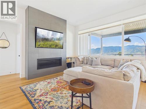 1081 Antler Drive, Penticton, BC - Indoor Photo Showing Living Room With Fireplace