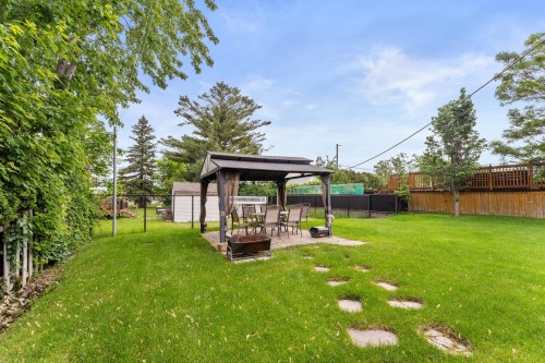 Courtyard - 130 Rue Des Roitelets, Delson, QC 