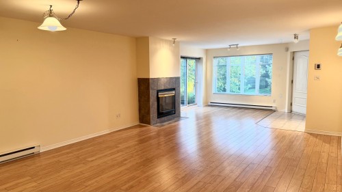 Salon - A-22 Av. Guindon, Saint-Sauveur, QC - Indoor Photo Showing Other Room With Fireplace