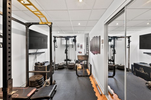 Chambre à coucher - 47 Rue Marcel-Vidal, Blainville, QC - Indoor Photo Showing Gym Room