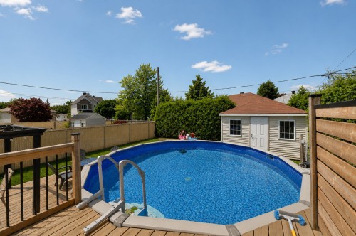 Terrasse - 47 Rue Marcel-Vidal, Blainville, QC - Outdoor With Above Ground Pool With Backyard