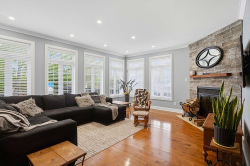 Salon - 12 Rue Des Lotus, Blainville, QC - Indoor Photo Showing Living Room With Fireplace