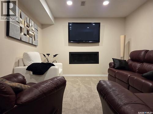 754 Golburn Crescent, Tisdale, SK - Indoor Photo Showing Living Room With Fireplace