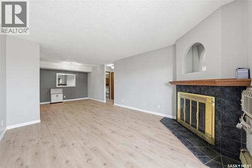 202 345 Kingsmere Boulevard, Saskatoon, SK - Indoor With Fireplace