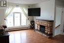 101 Queen Street, Stephenville, NL  - Indoor Photo Showing Living Room With Fireplace 