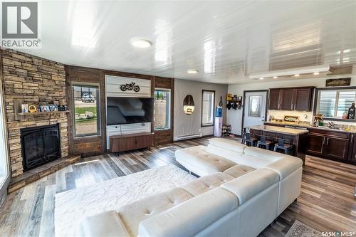 11 Sunrise Boulevard, Arm Lake, SK - Indoor Photo Showing Living Room With Fireplace