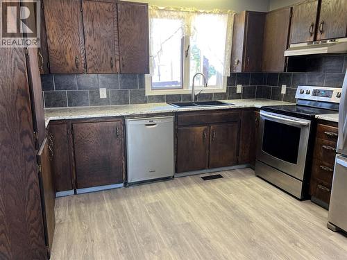 505 97A Avenue, Dawson Creek, BC - Indoor Photo Showing Kitchen With Double Sink