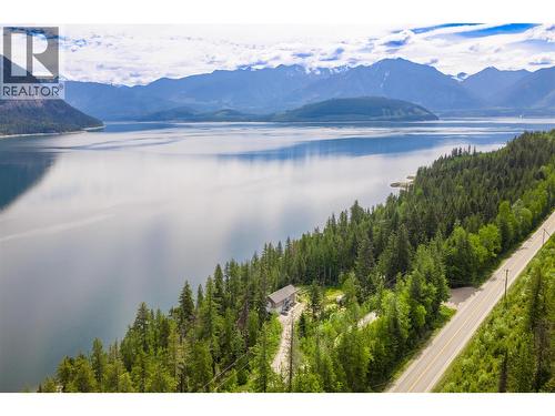 Highway 23 South showing access to private road and entrance to 8420 Hwy 23 S.  Approximately 8 km. from Ferry and 42 km from entrance to Highway 23S from Big Eddy Road. - 8420 Highway 23 Highway S Lot# 1, Revelstoke, BC - Outdoor With Body Of Water With View