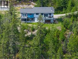 Drone View of Home Facing Lake and Mountain Views. - 