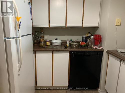 802 - 10 Tapscott Road, Toronto, ON - Indoor Photo Showing Kitchen