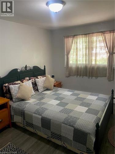 Bedroom featuring wood finished floors - 58 Hazelglen Drive, Kitchener, ON - Indoor Photo Showing Bedroom