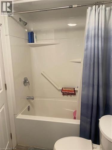 Bathroom featuring shower / bath combo - 58 Hazelglen Drive, Kitchener, ON 