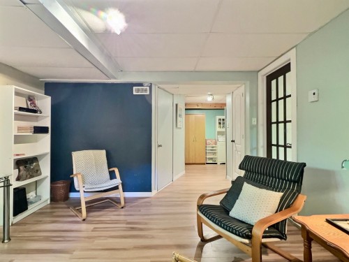 Salle familiale - 3655 Ch. Des Éperviers, Saint-Placide, QC - Indoor