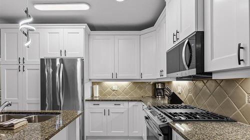 5403-4034 Pritchard Drive, West Kelowna, BC - Indoor Photo Showing Kitchen With Double Sink With Upgraded Kitchen