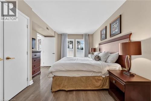 Bedroom with wood finished floors and a closet - 90 Highland Drive Unit# 2014/15, Simcoe, ON 