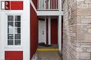 View of exterior entry with stone siding - 90 Highland Drive Unit# 2014/15, Simcoe, ON 