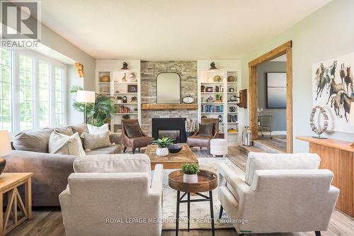 Curl up in front of the gas fireplace - 11276 Amos Drive, Milton, ON 