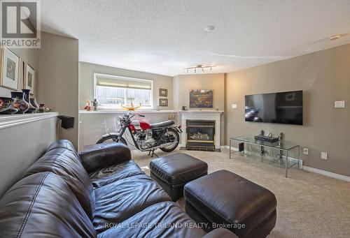 17 - 1100 Byron Baseline Road, London South (South K), ON - Indoor Photo Showing Living Room With Fireplace