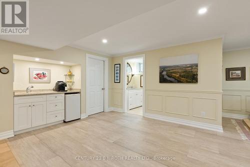 Bar area with fridge and sink - 75 Marine Drive, Innisfil, ON 
