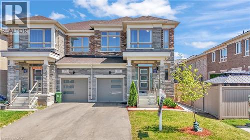 Contemporary multi-level facade with stone and brick accents - 101 Westfield Crescent, Waterdown, ON 