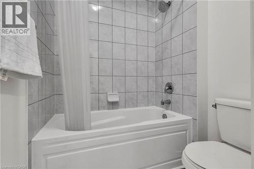 Main Bathroom with vanity area and tub and toilet area separated - 101 Westfield Crescent, Waterdown, ON 