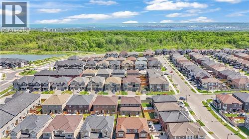 Aerial perspective showcasing a residential community with varied architectural styles - 101 Westfield Crescent, Waterdown, ON 