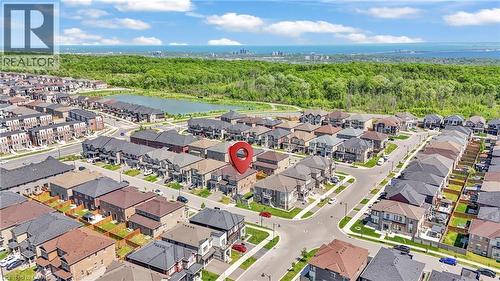 Aerial perspective of a developed residential area with a prominent corner property - 101 Westfield Crescent, Waterdown, ON 