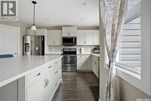 4073 Delhaye Way, Regina, SK - Indoor Photo Showing Kitchen With Stainless Steel Kitchen