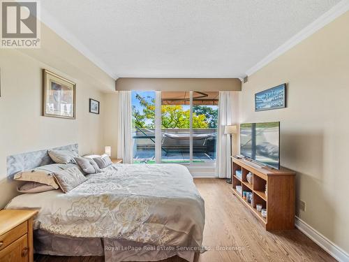 Primary Bedroom - 310 - 415 Locust Street, Burlington (Brant), ON - Indoor Photo Showing Bedroom