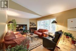 Main floor living room with gas fireplace - 
