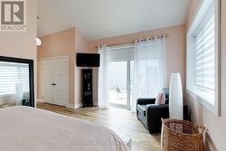 Primary Bedroom with Patio Doors to Private Deck - 