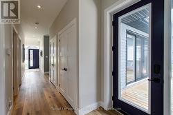 Hall from Primary Suite to Front Foyer - 