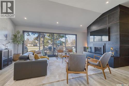 2725 Preston Avenue S, Saskatoon, SK - Indoor Photo Showing Living Room With Fireplace