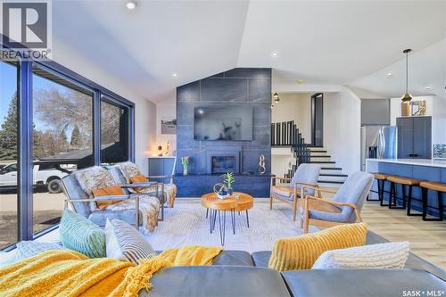 2725 Preston Avenue S, Saskatoon, SK - Indoor Photo Showing Living Room With Fireplace