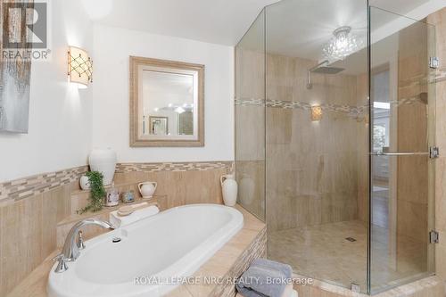 Ensuite soaker tub and walk in shower - 1629 Pelham Street N, Pelham (Fonthill), ON - Indoor Photo Showing Bathroom