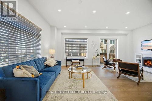 75 Borers Creek Circle, Hamilton, ON - Indoor Photo Showing Living Room With Fireplace