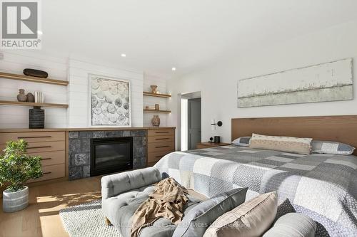 6472 Mcniven Court, Burlington, ON - Indoor Photo Showing Bedroom With Fireplace