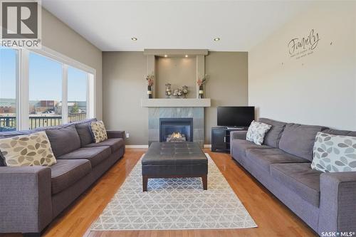 231 Willowgrove Boulevard, Saskatoon, SK - Indoor Photo Showing Living Room With Fireplace