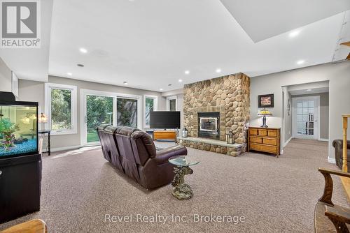 7190 93 Highway, Tiny, ON - Indoor With Fireplace