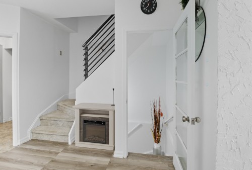 Staircase - 151 Rue Madaire, Gatineau (Aylmer), QC - Indoor Photo Showing Other Room With Fireplace